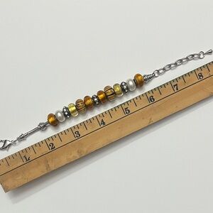 Beaded Bracelet with Silver and Amber Tones